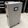 48V Tower rugged LifePO4 battery with active balancing, 200A BMS, breaker, monitoring display, and fire extinguisher on lockable wheels