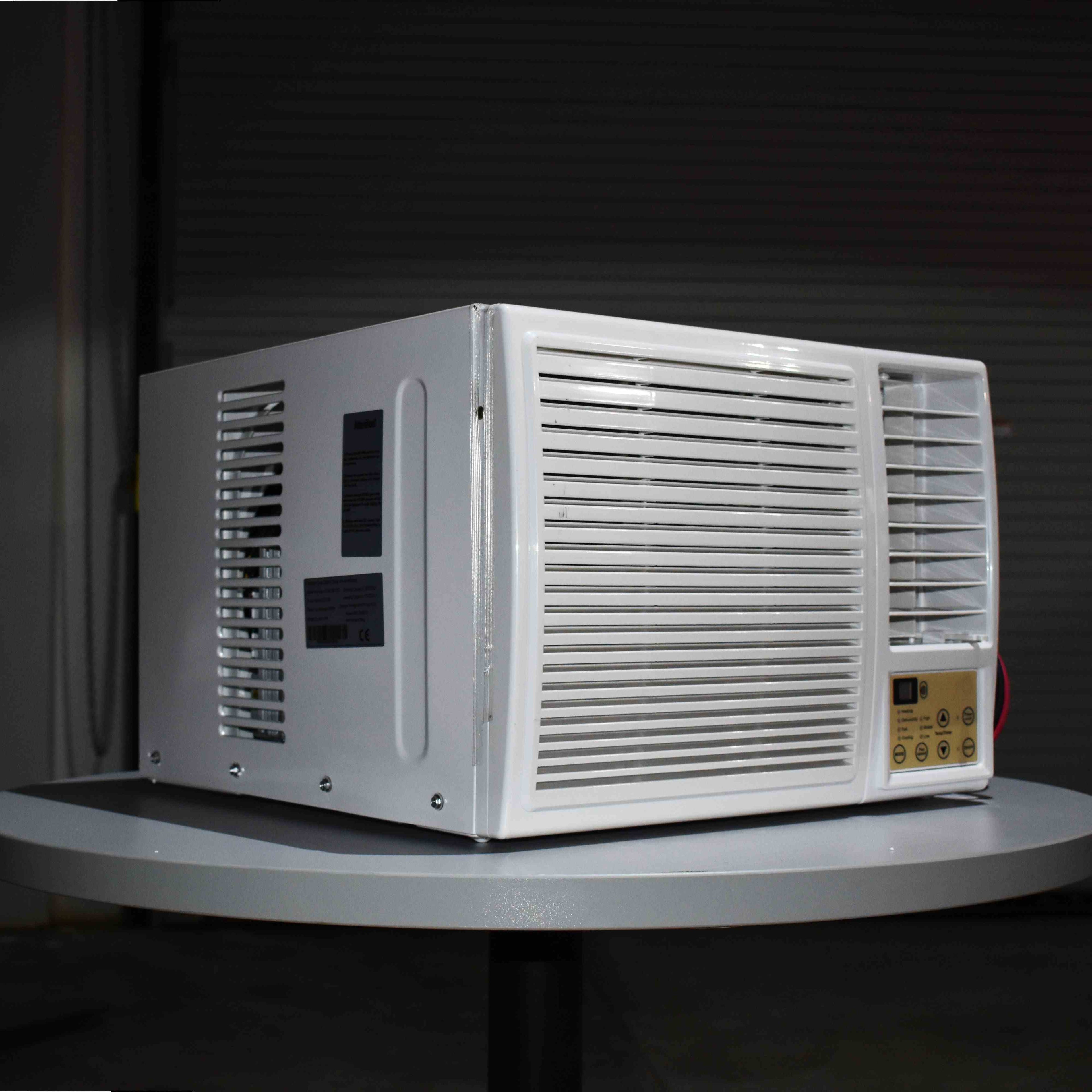 24V DC window air conditioner and heater unit designed for off-grid battery operation