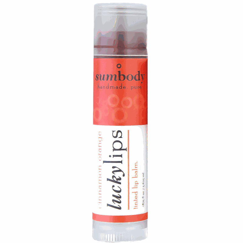 Tinted lip balm tube with natural ingredients like shea butter and avocado oil for hydration and color
