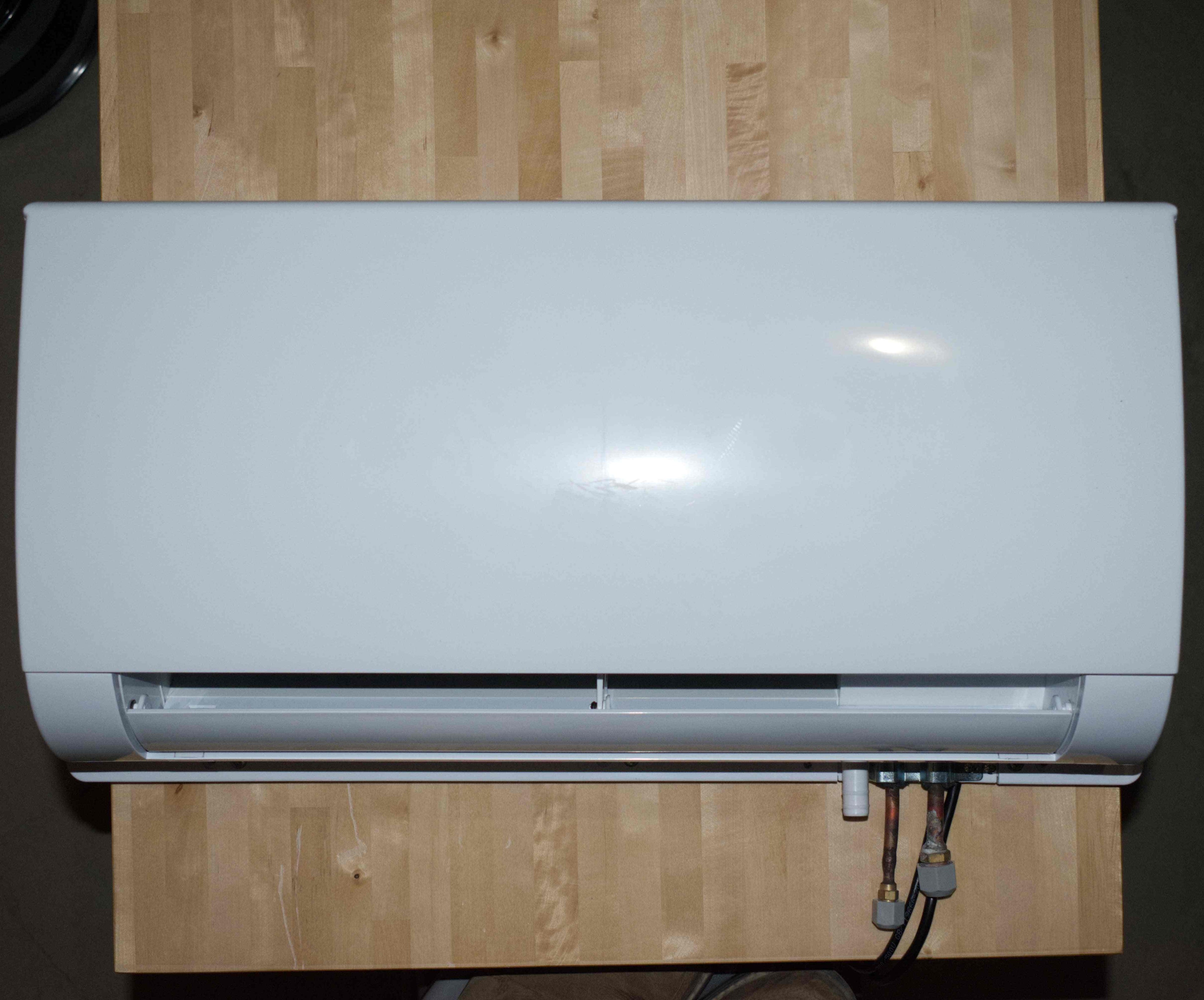 7000 BTU/h Compact Pure DC Mini Split Heat Pump w/ bracket