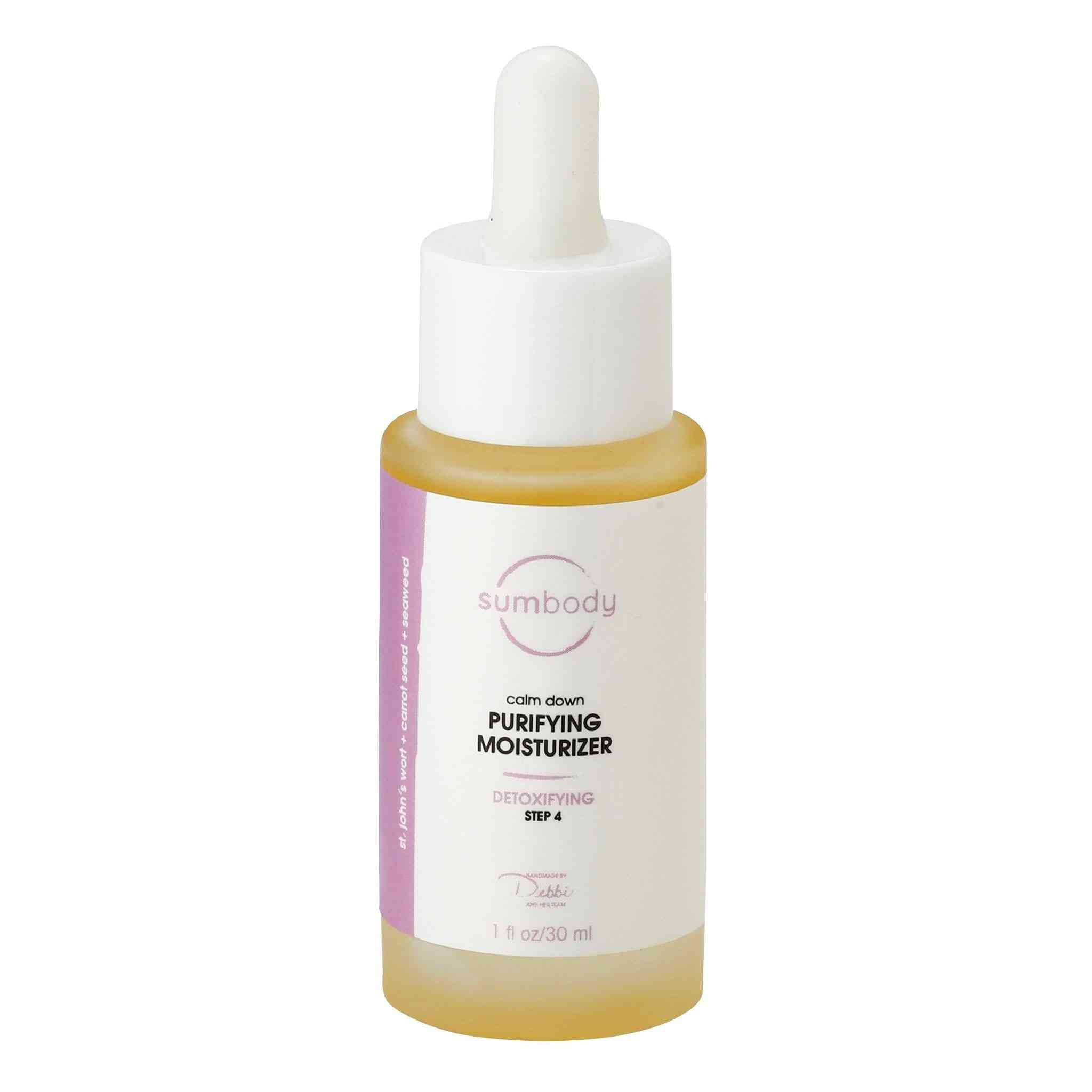 Calm Down Purifying Moisturizer bottle with carrot and jojoba oil for dry and oily skin hydration and balance