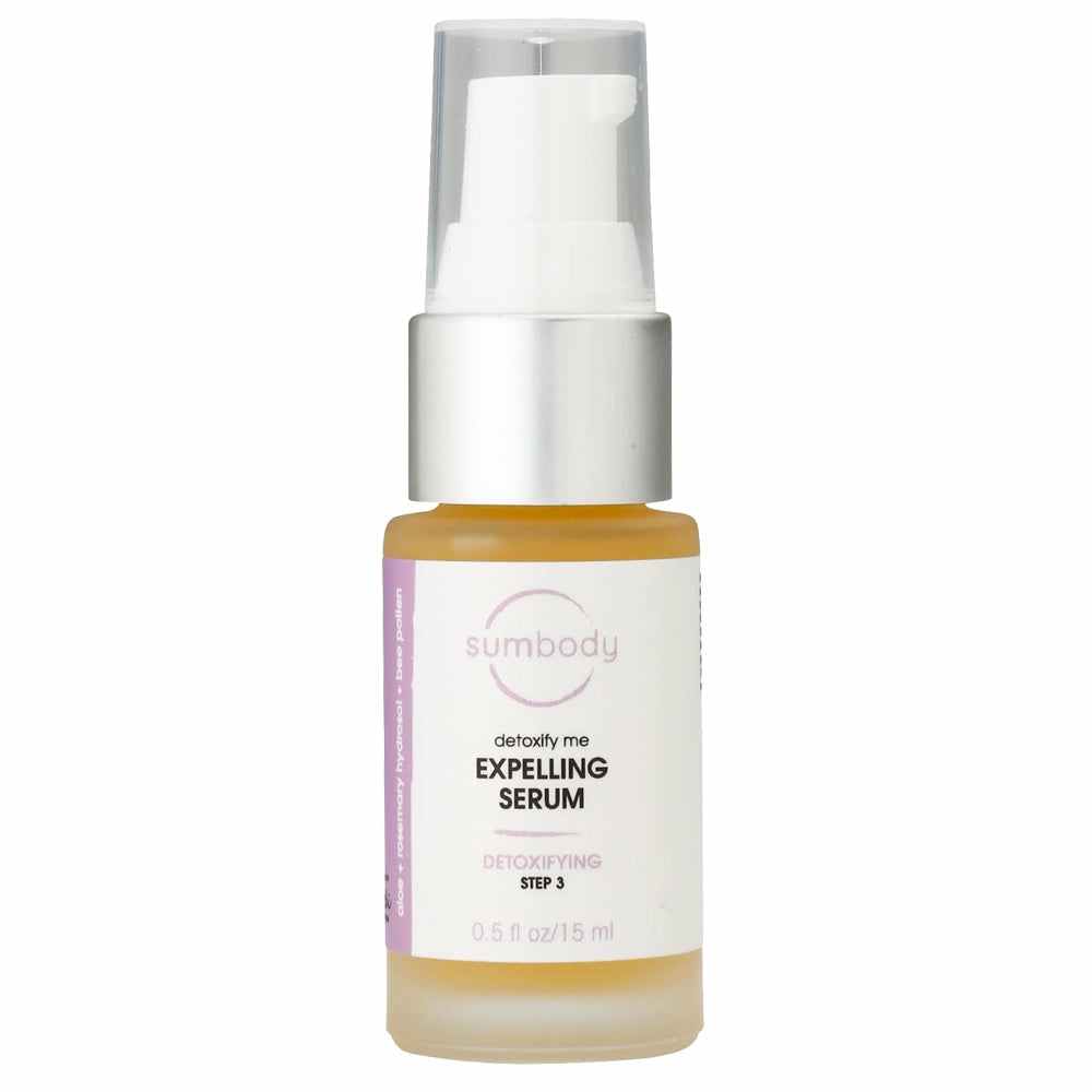 Detoxify Me Expelling Serum bottle with tropical pineapple and papaya background for clear skin