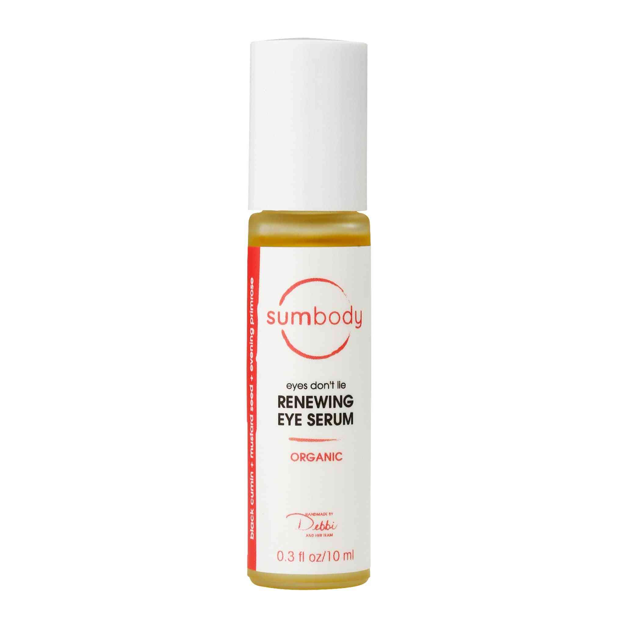 Bottle of Eyes Don’t Lie Renewing Eye Serum with roller applicator on white background