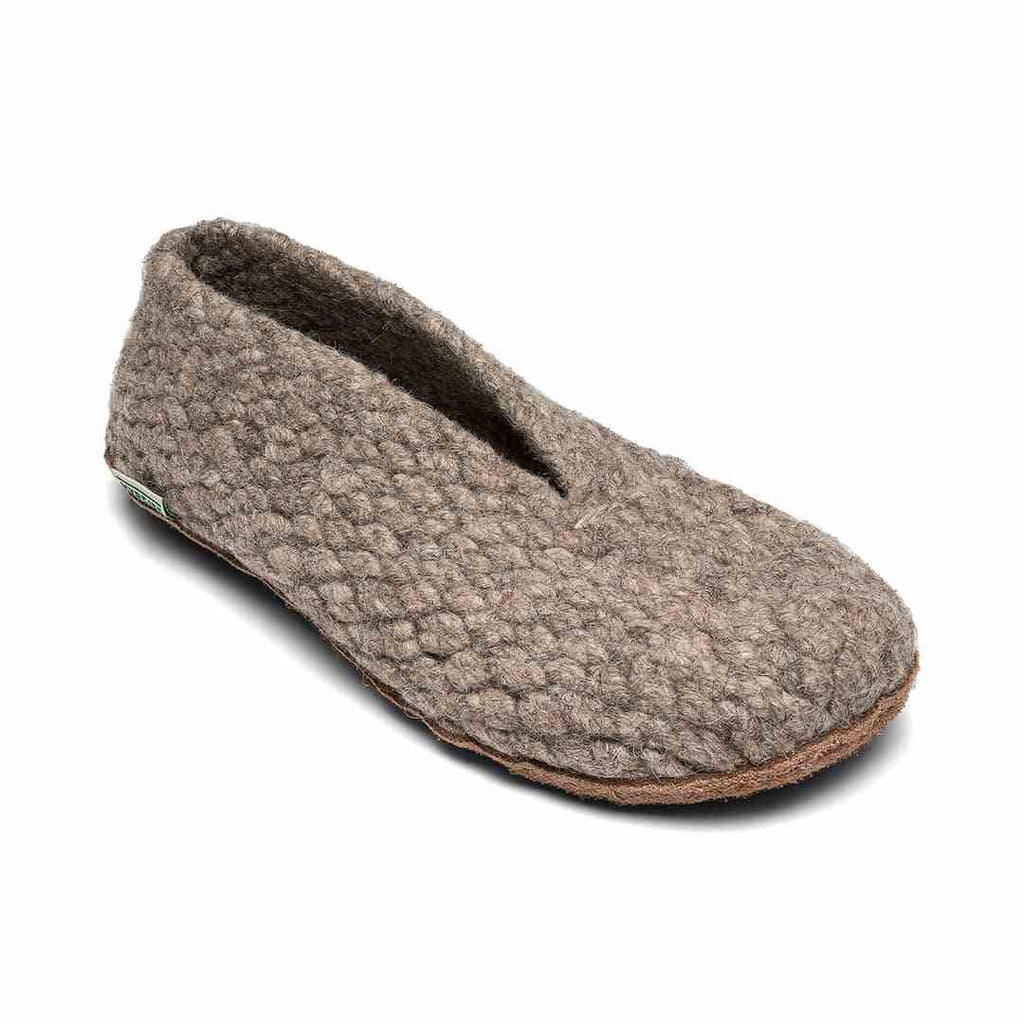 Pair of Kyrgies Wovens handmade wool slippers in natural colors showcasing traditional woven design