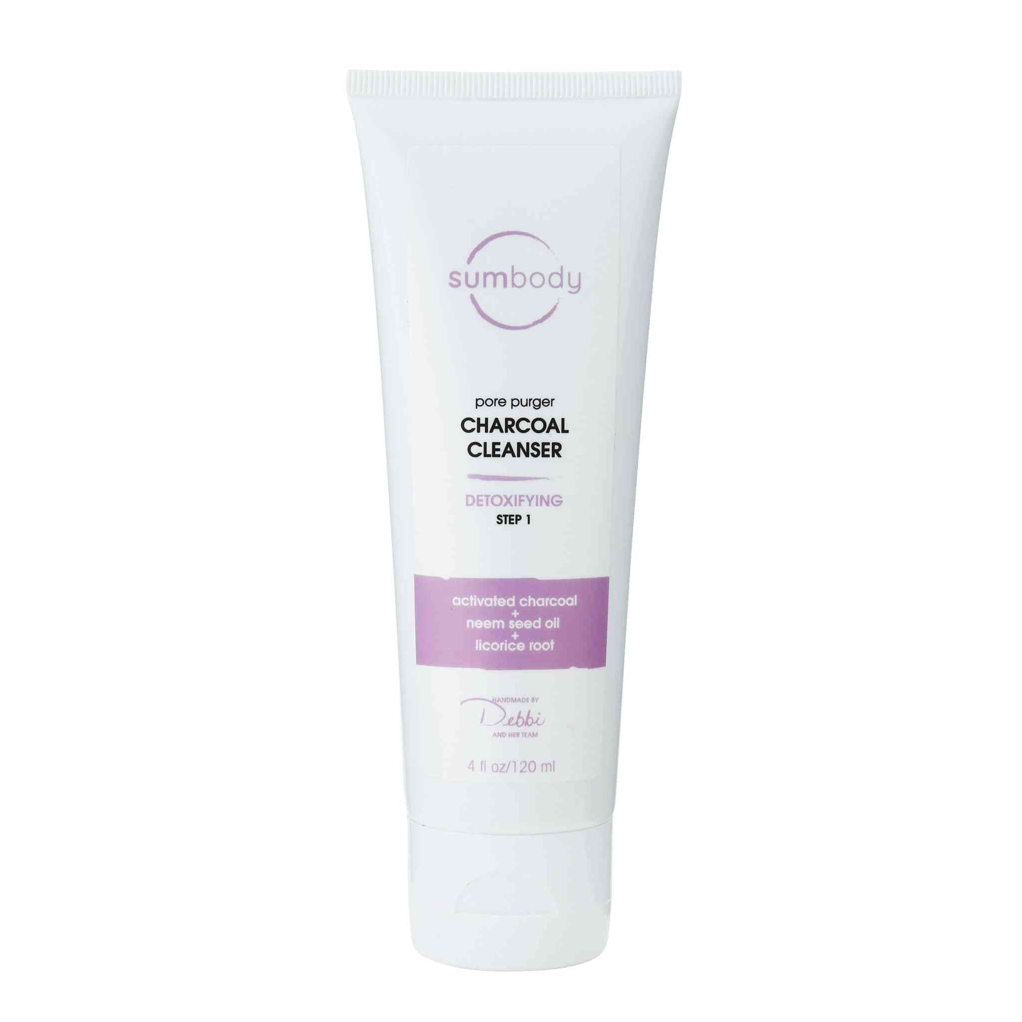 Bottle of Pore Purger Charcoal Cleanser with bamboo and coconut hull charcoals for deep pore cleansing and acne control