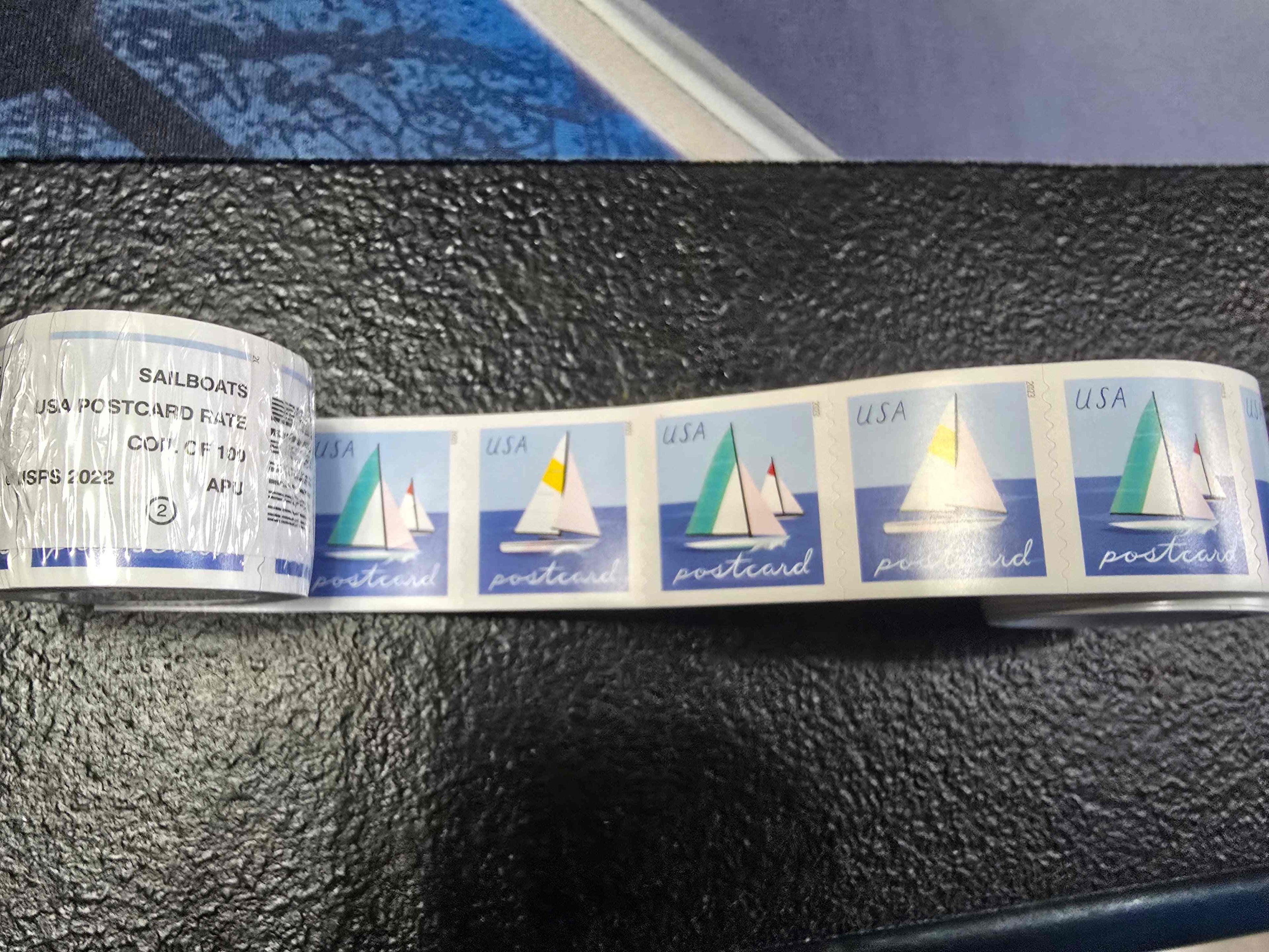 Coil of 100 sailboats postcard stamps