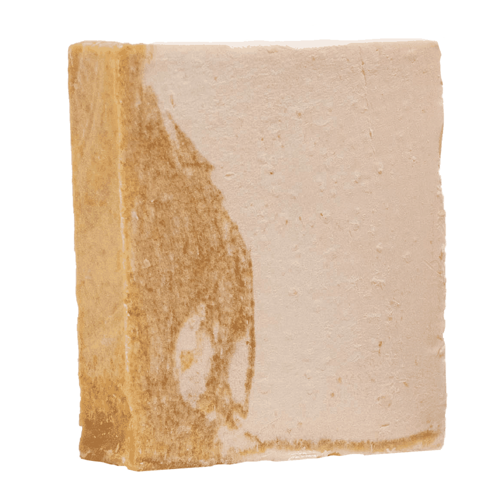 Bar of Cookie Batter Natural Soap with creamy texture and vanilla aroma on rustic wooden surface